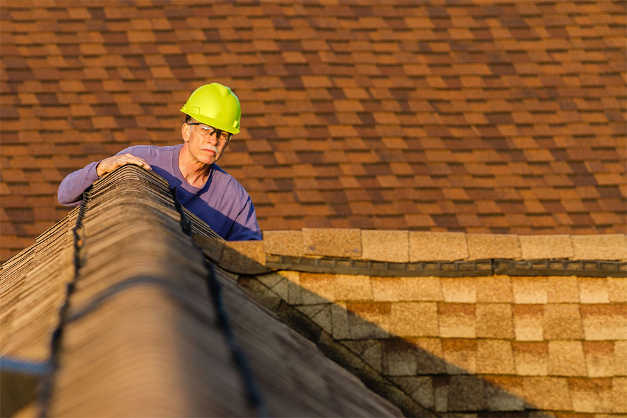 Roofing Contractor Inspecting